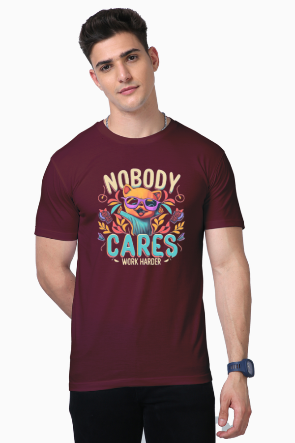 "Empower your journey with our motivational T-shirt: 'Nobody cares, Work Harder.' A daily reminder to stay focused and hustle relentlessly. Elevate your style and mindset. Order now!"