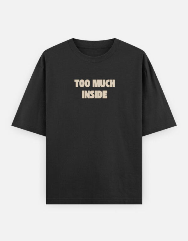 2f Oversized streetwear T-shirt featuring Too Much Inside Emotional Graphic Tee India typography on the front and artistic heart graphic print on the back, photographed in a scenic sunset outdoor location.